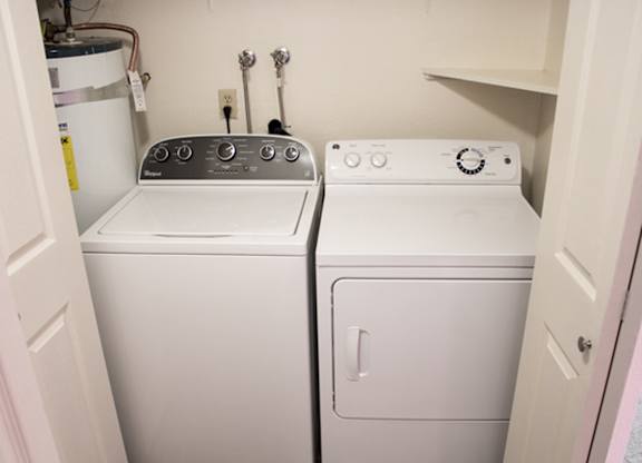 a washer and dryer in the laundry room