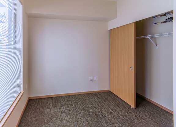 bedroom of one bedroom unit at boxcar