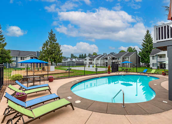 our apartments have a resort style pool with lounge chairs