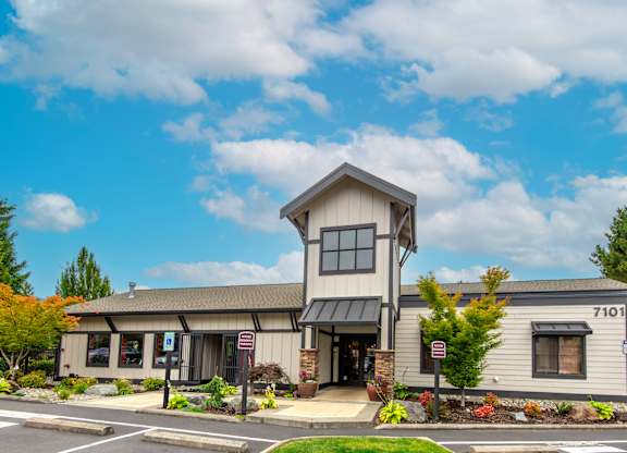 a picture of the front of the building with a blue sky in the background