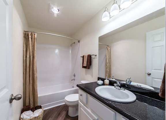 a bathroom with a sink and a toilet