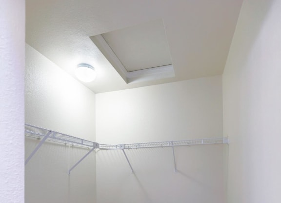 a room with white walls and a carpet