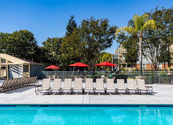 Pool with sundeck at The Woods Apartments, San Jose, CA, 95136