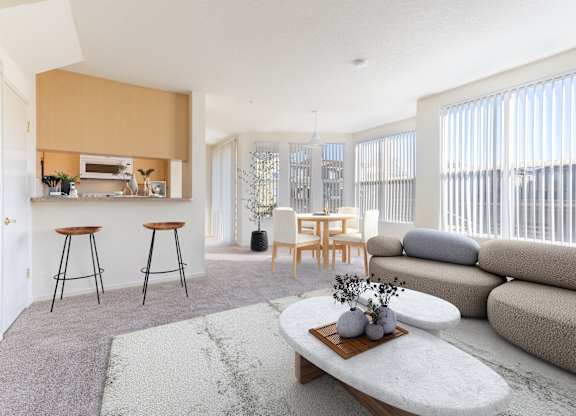 A modern living room with a bar area and a grey sofa at The Woods Apartments, California, 95136