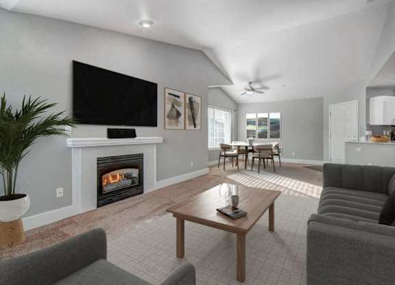 High Ceilings with Fireplace and Comfortable Grey Couch at Clock Tower Village, DuPont, 98327