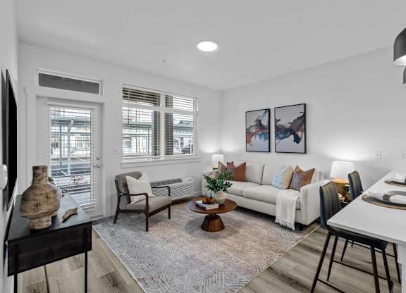 a living room with a couch and a table