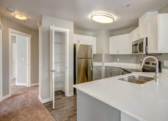 kitchen with stainless steel appliances at Clock Tower Village, DuPont