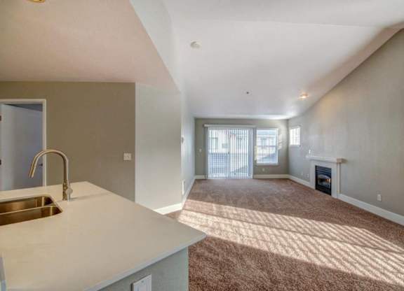 living area with carpeting at Clock Tower Village, DuPont, WA
