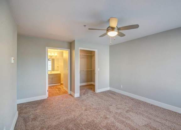 Spacious Bedroom with Ceiling Fan, and Attached Bathroom at Clock Tower Village, DuPont, WA 98327