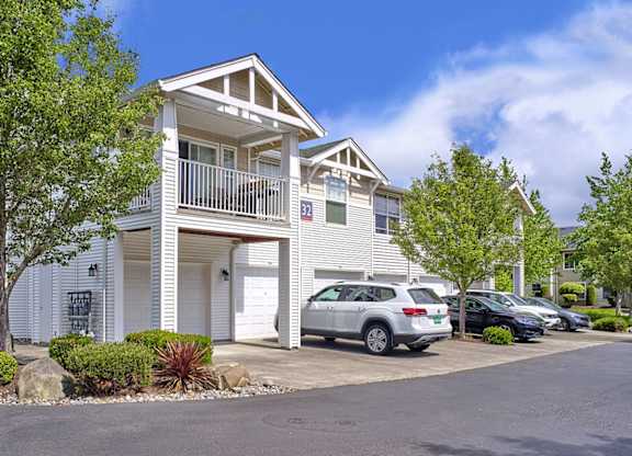 Community exterior with attached garages at Clock Tower Village, DuPont Washington