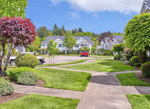 landscaping and side walks at Clock Tower Village, DuPont, 98327