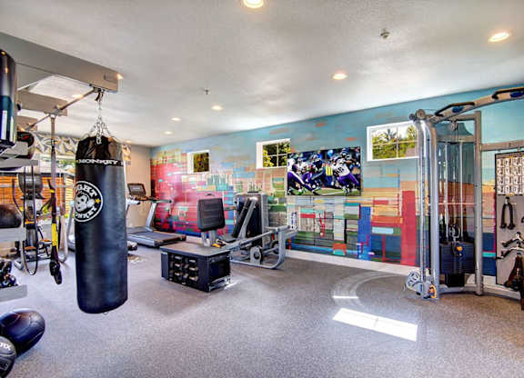 fitness center with cardio and weight equipment at Clock Tower Village, DuPont, 98327
