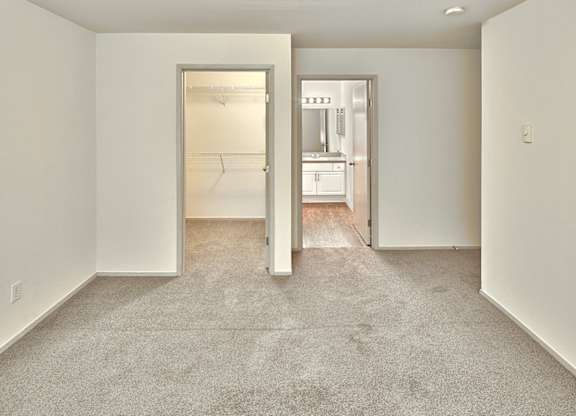 bedroom with large closet at Clock Tower Village, Washington