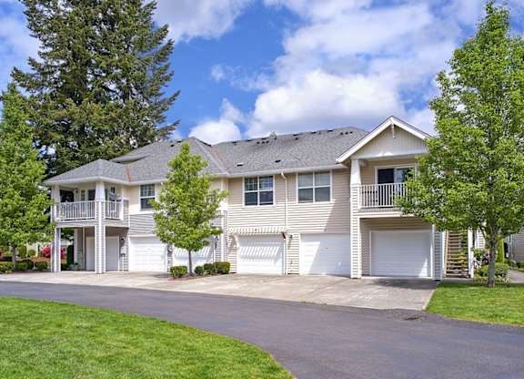 community exterior with attached garages at Clock Tower Village, DuPont, WA