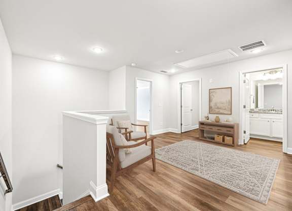 Loft area ideal for family gatherings just steps from the upstairs bedrooms.