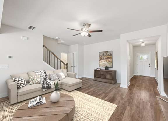 A refined living area offering a graceful view of the home’s entryway.