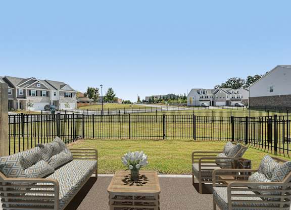 A private fenced patio offering an elegant outdoor retreat.