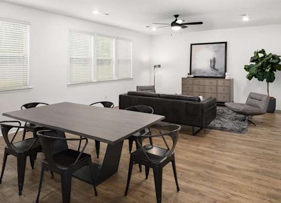 Living room with open view to kitchen.
