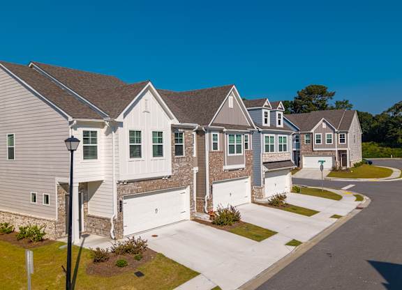 Overhead view of the home and its inviting surroundings.