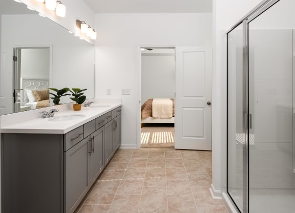 a bathroom with a sink and a shower