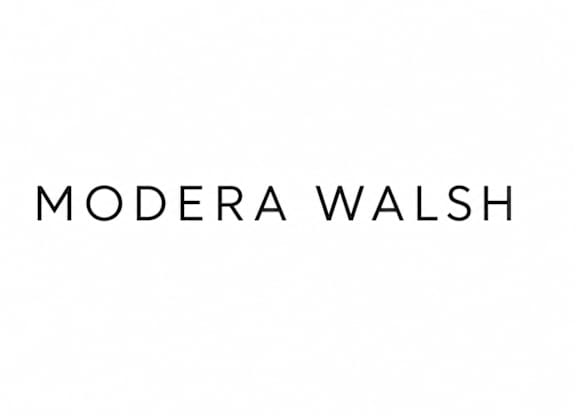 A white background with the words "Modera Walsh" written in black.