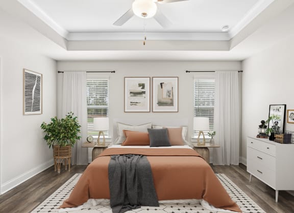 a bedroom with a bed and a ceiling fan
