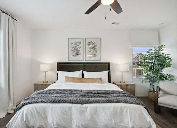 The king size bed in the primary suite.