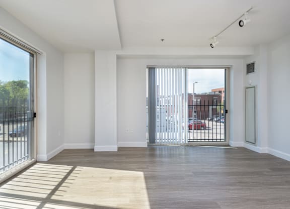 Living room area in the corner apartments at Munroe Place in Quincy, MA