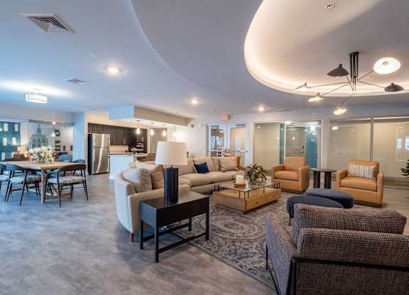 A well-appointed fitness center featuring free weights and strength training equipment.