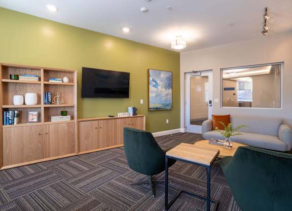 The community cyber lounge / cafe with seating and tv