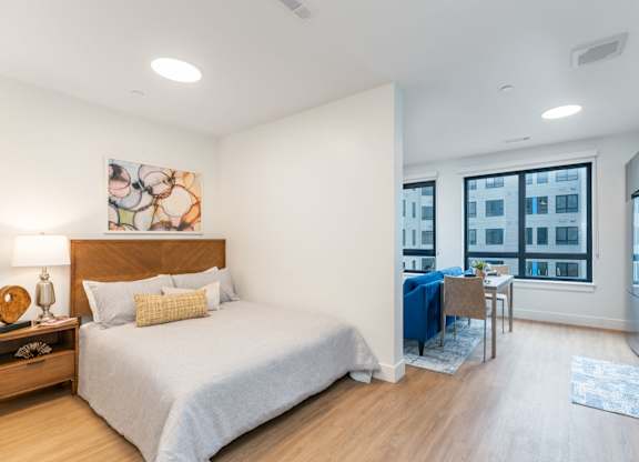 Studio apartment with seperated spaces for bed and dining