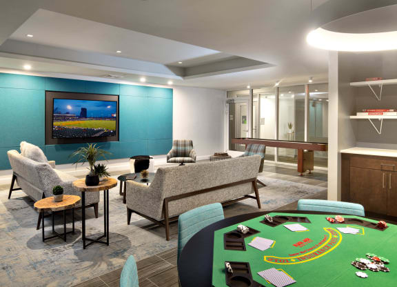 a room filled with furniture and a flat screen tv