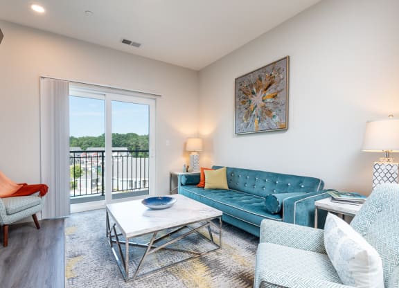 Millside living room model open floor plan balcony and wood finish flooring wide plank