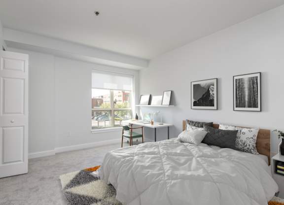 Bedroom view at Munroe Place in Quincy, MA- virtually staged