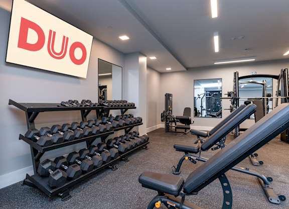 A gym with a sign that says