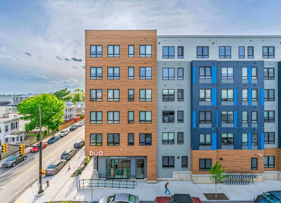 A multi-story building with the word "Duo" on the front.