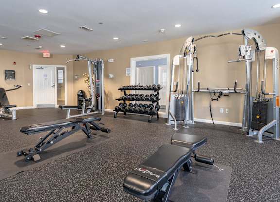 Parkside Commons gym with a variety of equipment including a leg press machine.