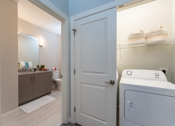 Two bedroom model bathroom and private washer and dryers