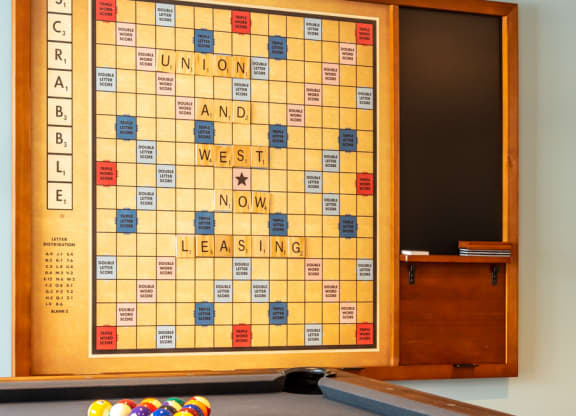 community room with pool table and scrabble board