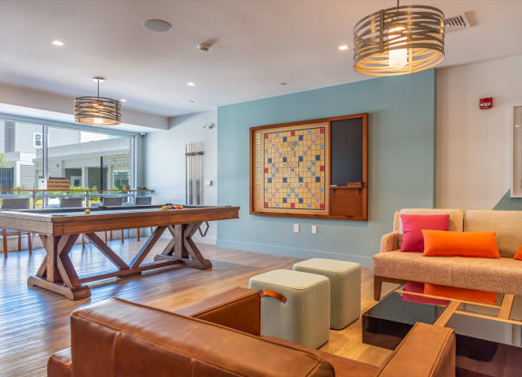 Union and west community room with fireplace games, lounge seating
