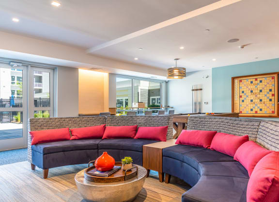 Union and west community room with fireplace games, lounge seating