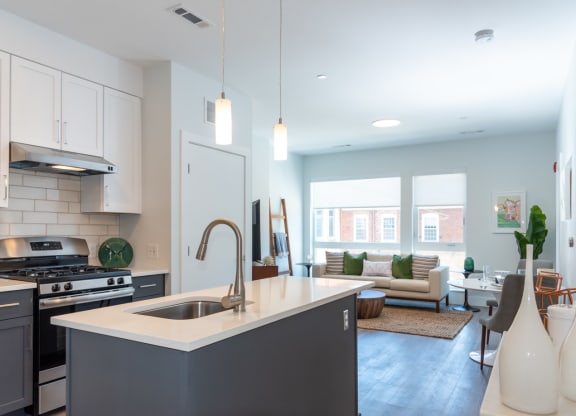 model apartment kitchen with stainless appliances