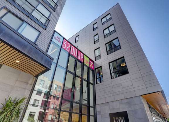 Exterior of 3200 washington, tall glass entry