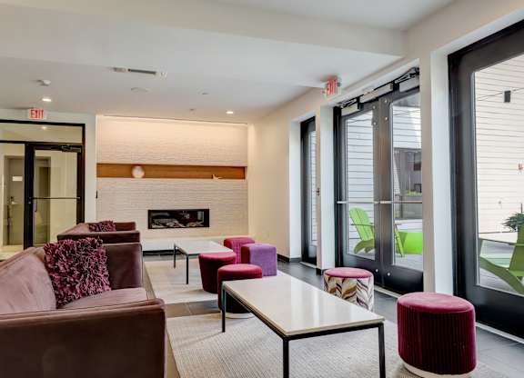 Clubhouse with lounge seating and a fireplace