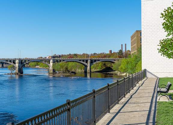 The courtyard at Washington Mill 240 with riverfront views