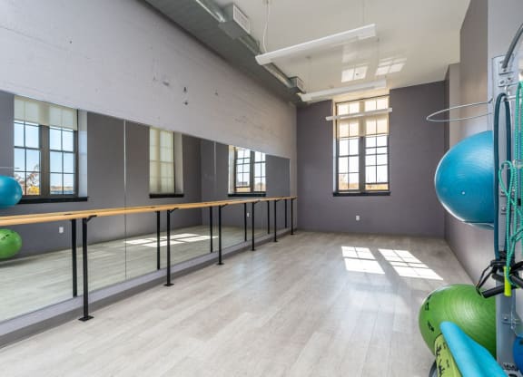 The fitness center at WM240 with yoga studio and yoga balls