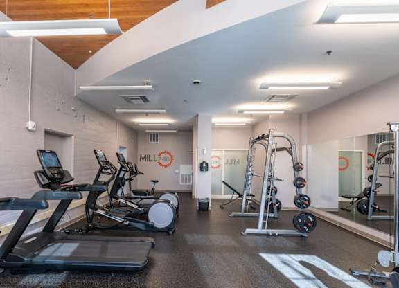 the fitness center at Washington Mill 240 with free weights, cardio equipment, smith machine and more