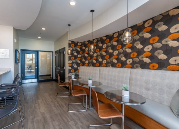 Community lounge kitchen area with lounge cafe style seating and bartop seating