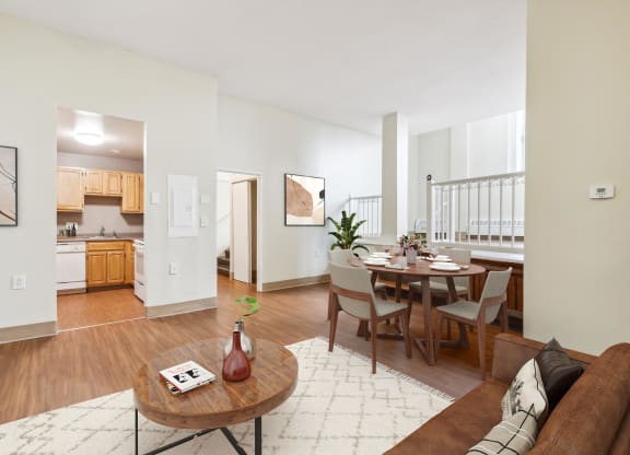 an open living room with a dining room table and a kitchen at Chapman House, E. Boston, Massachusetts, 02128