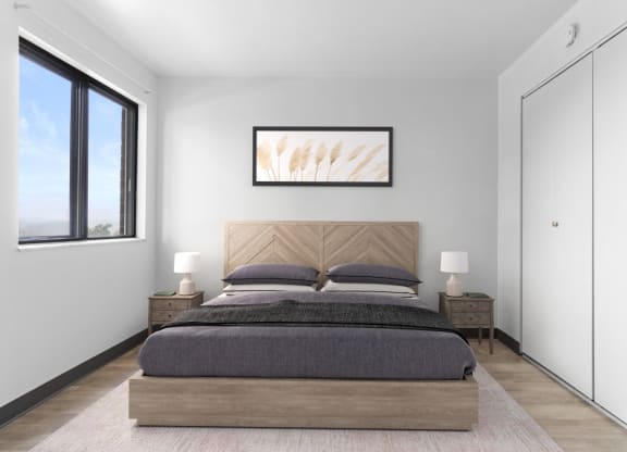 a bedroom with a bed in a room  at Belvedere Acres Apartments, Washington, PA, 15301